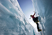 Man ice climbing, Pasterze Glacier, Grossglockner, Carinthia, Austria
