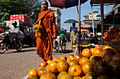 Buddhistic monk on the street market in Mawlamyaing, Mon State, Myanmar, Birma, Asia