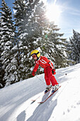 Child schuss skiing, glide path ski area Heuberg, Hirschegg, Kleinwalsertal, Vorarlberg, Austria
