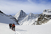 Ski mountaineers on their way to Piz Buin, Engadin, Grisons, Switzerland, Europe