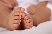 Barefeet, Barefoot, Boy, Boys, Child, Children, Close-up, Closeup, Color, Color image, Colour, Contemporary, Delicate, Feet, Foot, Horizontal, human, indoor, indoors, Infant, Infants, interior, Kid, Kids, Little, Male, One, One person, people, person, per