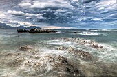 Nor'west storm clouds, Kaikoura headland, North Canterbury, New Zealand