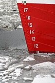 boat, cipher, cold, coldness, Color image, concept, day, detail, figure, float, floating, frozen, hull, ice, measure, measurement, measuring, number, outdoor, red, vertical, vessel, K90-1036000, AGEFOTOSTOCK