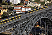 Porto Metro crossing Dom Luis I Bridge seen from Jardim do Morro, Porto, Portugal