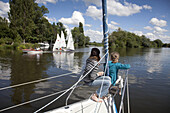 Girls on a sailing boat, Havel, Brandenburg, Germany