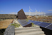 Windmills and solar collectors at ITER Eoparc, South Tenerife, Canary Islands, Spain