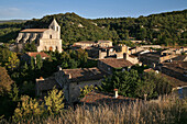 Hilltop Village On The Northern Slope Of The Haut Luberon And Notre-Dame De La Pitie Church, Saignon, Vaucluse (84), France