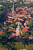 Aerial shot of old town with St. Michael's Church and St. Nicholas' Church, Luneburg, Lower Saxony, Germany