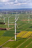 Aerial shot of wind farm on fields, Lower Saxony, Germany