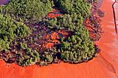 Aerial view of red mud waste product in a holding pond from an aluminium production site near Stade, Lower Saxony, Germany