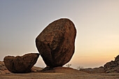 Balancing granite rock laying on slab, Bull´s Party, Ameib, Erongo mountains, Namibia