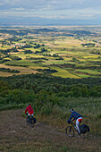 Pilgrims with mountain bikes, Uterga, Navarra, Spain