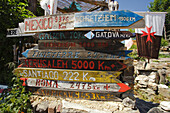 Wooden signpost in the sunlight, Manjarin, Province of Leon, Old Castile, Castile-Leon, Castilla y Leon, Northern Spain, Spain, Europe