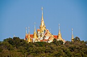 Golden Wat Tang Sai on Khao Tong Chai Mountain above Ban Krut Beach in Thailand