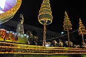 Bangkok (Thailand): the nighttime floats parade by the Democracy Monument during the king Bhumibol Adulyadej birthday's public commemoration (December 5th)