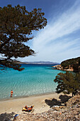 Couple at beach, Mirabello Bay, Crete, Greece