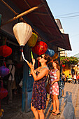 Two women shopping, Chua Cau, Japanese Bridge, Hoi An, Annam, Vietnam