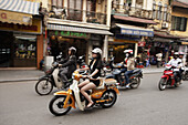 Moped riders, old town, Hanoi, Bac Bo, Vietnam
