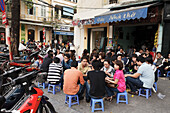 Guests in front of a cafe, cathedrals quarter, Hanoi, Bac Bo, Vietnam