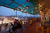 Terrace cafe with a view over the city in the evening, Hanoi, Bac Bo, Vietnam