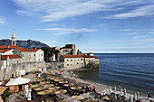 View of the citadel and city beach, Budva, Montenegro, Europe