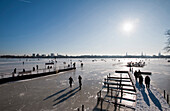 People on frozen Aussenalster, winter impressions, Hamburg, Germany, Europe