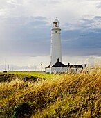 The lighthouse at Nash Point near Marcross on the Glamorgan Heritage Coast of South Wales overlooking the Bristol Channel