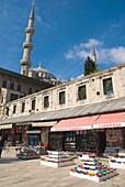 Souvenir shops outside Sultan Ahmet mosque Sultanahmet district Istanbul Turkey Europe