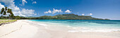 Panorama of a caribbean beach with view to mountains, Dominican Republic