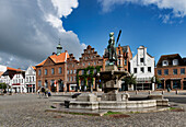 Market square with Rasmussen Woldsen Fountain, Husum, Schleswig-Holstein, Germany