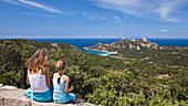 Mother and daughter watching Cap de Roccapina, Corsica, France