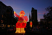 Chistmas decorations, Kaiser Wilhelm Memorial Church in the background, Berlin, Germany
