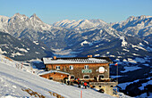 Hornkoepfl hut with Loferer Steinbergen, Ski resort Kitzbuehler Horn, Kitzbuehel, Winter in Tyrol, Austria