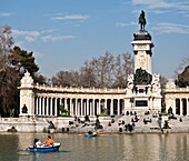 King Alfonso XII monument and El Estanque lake in The Retiro Park in the centre of Madrid, Spain