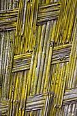 Detail of a fence woven by the Dorze people of Ethiopia The tribe of the Dorze is living high up in the Guge Moutains above the ethiopian part of the rift valley Dorze can be translated with weaverWeaving of fabrics and garments is the traditional ma