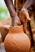 Pottery of the Dorze people of Ethiopia, Detail The tribe of the Dorze is living high up in the Guge Moutains above the ethiopian part of the rift valley Dorze can be translated with weaverWeaving of fabrics and garments is the traditional main sourc