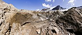 Panorama of the melting glacier Hochjochferner on the mountain pass Hochjoch Giogo Alto right at the border of Italy and Austria in Oetztal and Schnalstal val Senales The glacier hochjochferner retreated rapidly due to global warming, exposing more and