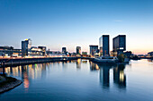 Buildings at Media Harbour at night, Düsseldorf, Duesseldorf, North Rhine-Westphalia, Germany, Europe