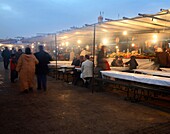 Food stalls in Djemaa el fna square at sunset, Marrakech, Morocco