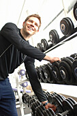 Young man at weight rack, General, Leisure & Activities