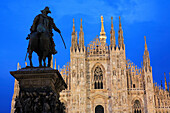 Piazza Duomo - cathedral and statue at night, Milan, Lombardy, Italy