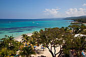 View of St Anns Bay over trees, Ocho Rios, Jamaica, Caribbean