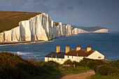 Seven Sisters cliffs and coastguard cottages, Eastbourne, East Sussex, UK - England