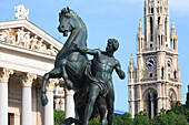 Parliament  with statue and Rathaus - City Hall, Vienna, Austria