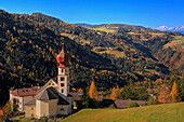Church and alpine scenery in autumn, Tires, Italian Dolomites, Italy