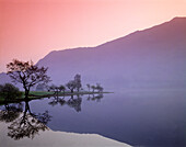 Lake scene at dawn, Ullswater, Cumbria, UK - England