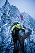 Mountaineers at southeast ridge of Wildspitze, Oetztal Alps, Tyrol, Austria