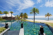 Pool and restaurant of the Shanti Maurice Resort in the sunlight, Souillac, Mauritius, Africa