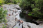 People bathing in a river, La Reunion, Indian Ocean