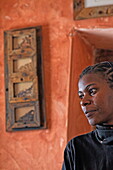 Local woman at Msumbi coffee house, Stonetown, Zanzibar City, Zanzibar, Tanzania, Africa